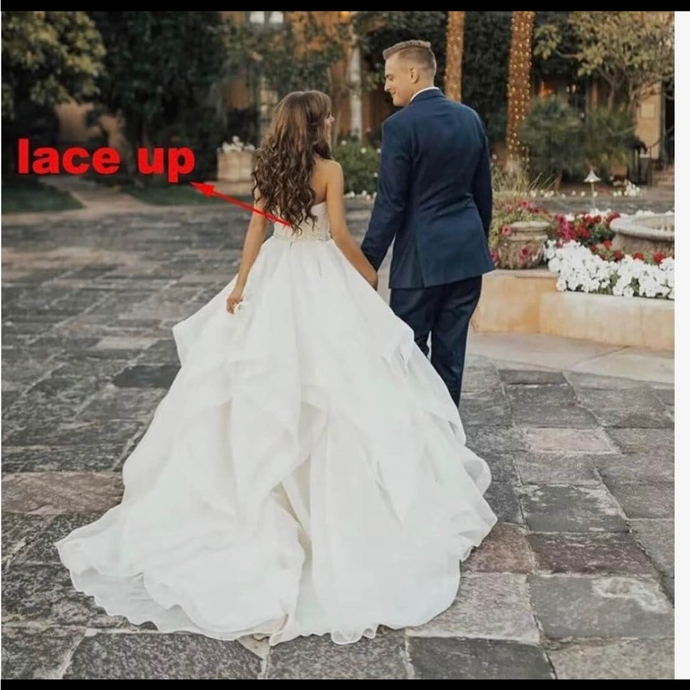 Elegant White Strapless Wedding Dress - Picture 3 of 6